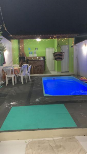 Casa com Ar e piscina no centro